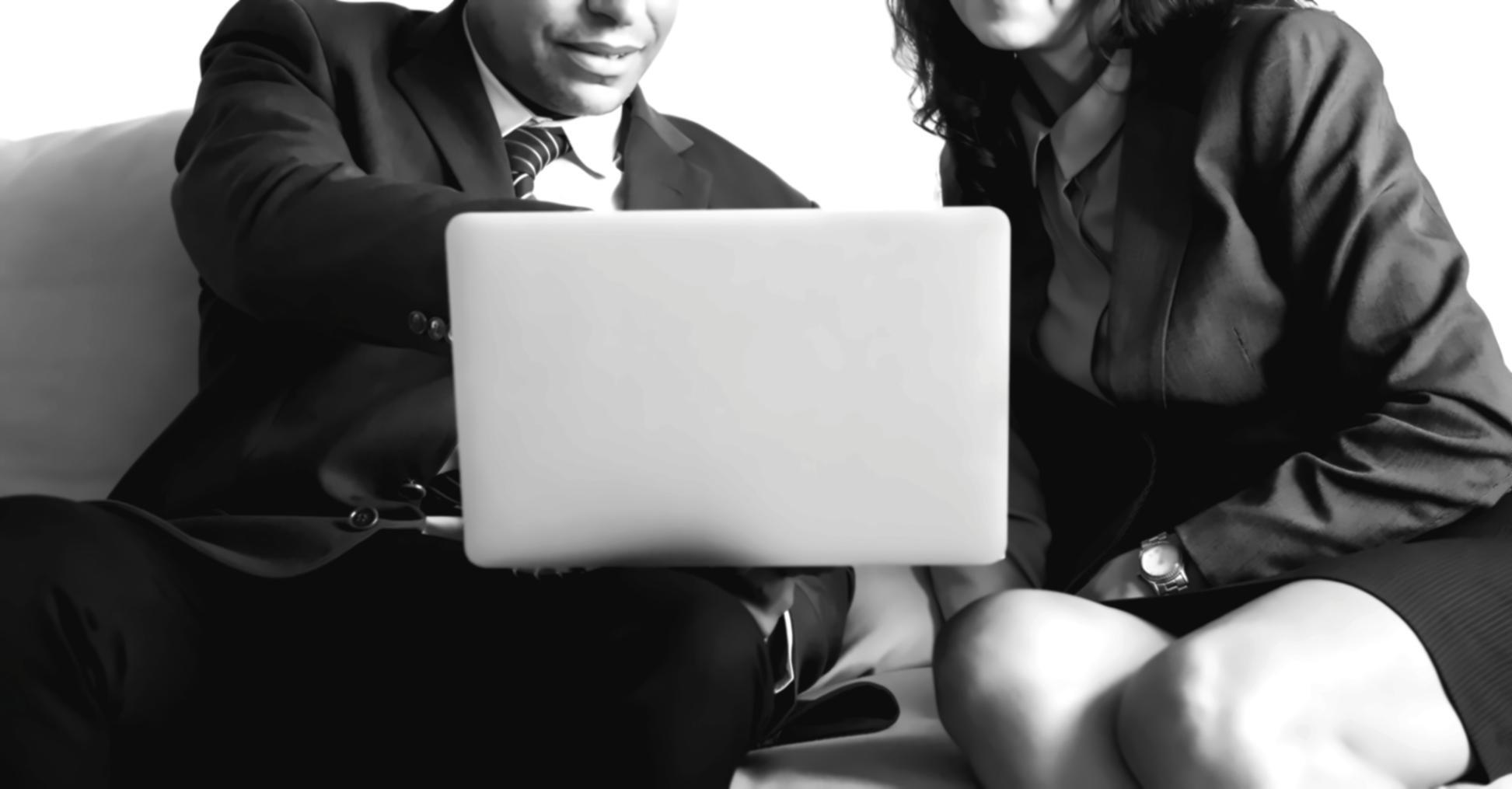 Person reviewing financial documents with a calculator and notebook