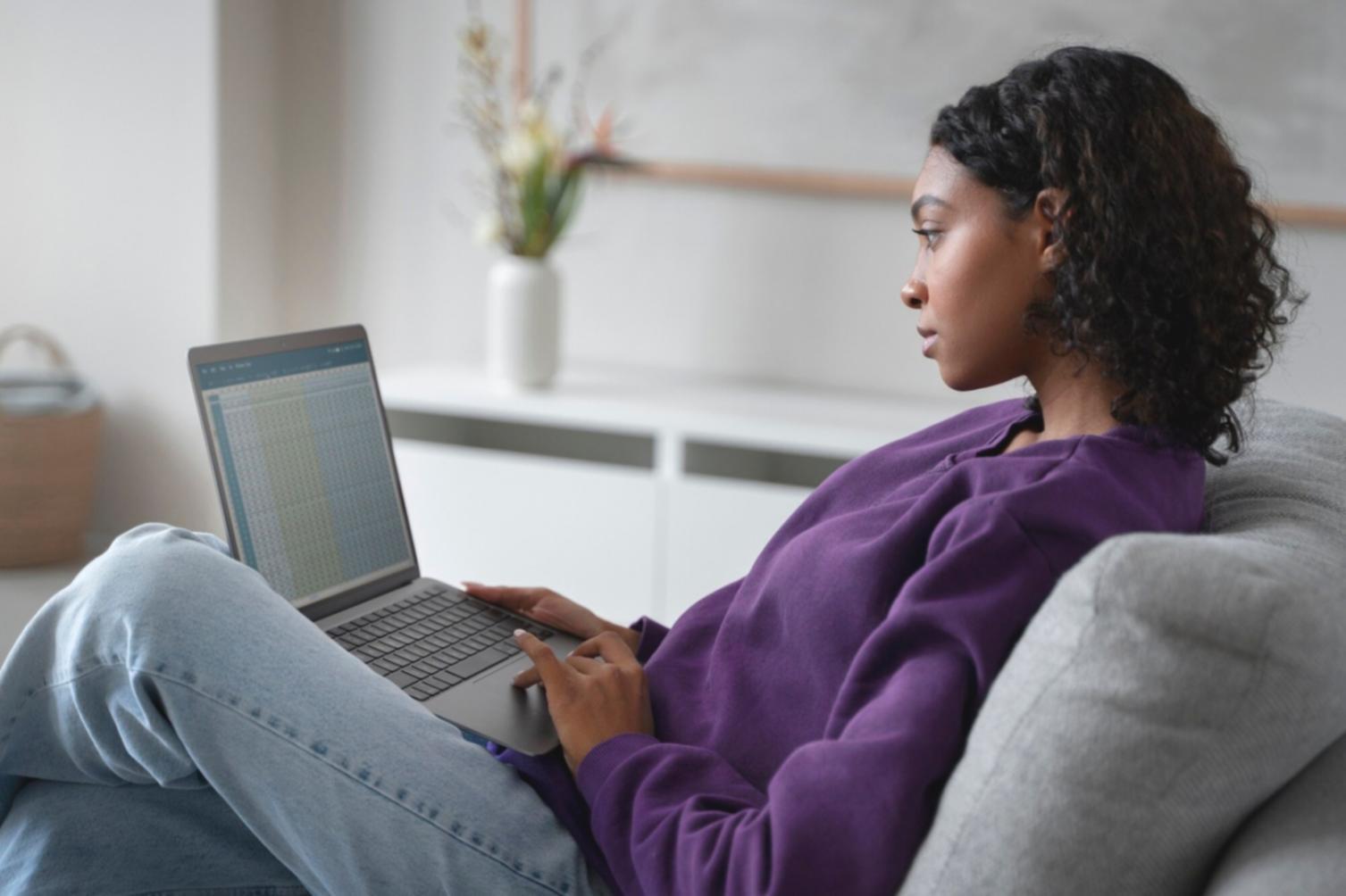 Detailed financial analysis and planning materials spread across a desk
